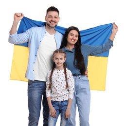 Photo of Happy family with flag of Ukraine on white background