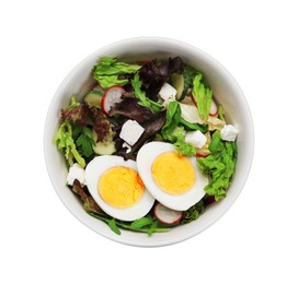 Delicious salad with boiled egg, feta cheese and vegetables in bowl isolated on white, top view