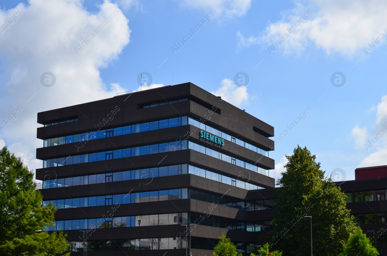 Photo of HAGUE, NETHERLANDS - SEPTEMBER 10, 2022: Building of Siemens Headquarters on sunny day