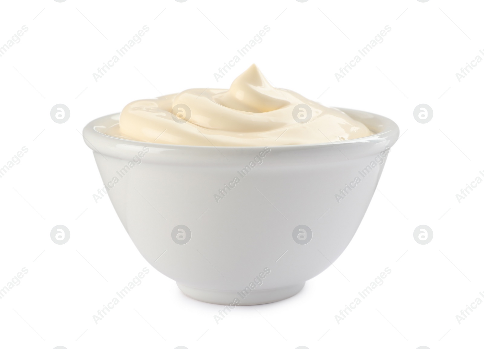 Photo of Bowl with tasty mayonnaise isolated on white