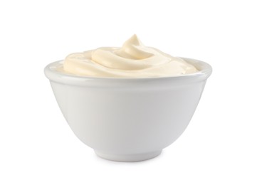 Photo of Bowl with tasty mayonnaise isolated on white