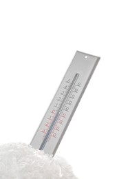 Photo of Weather thermometer in snow against white background