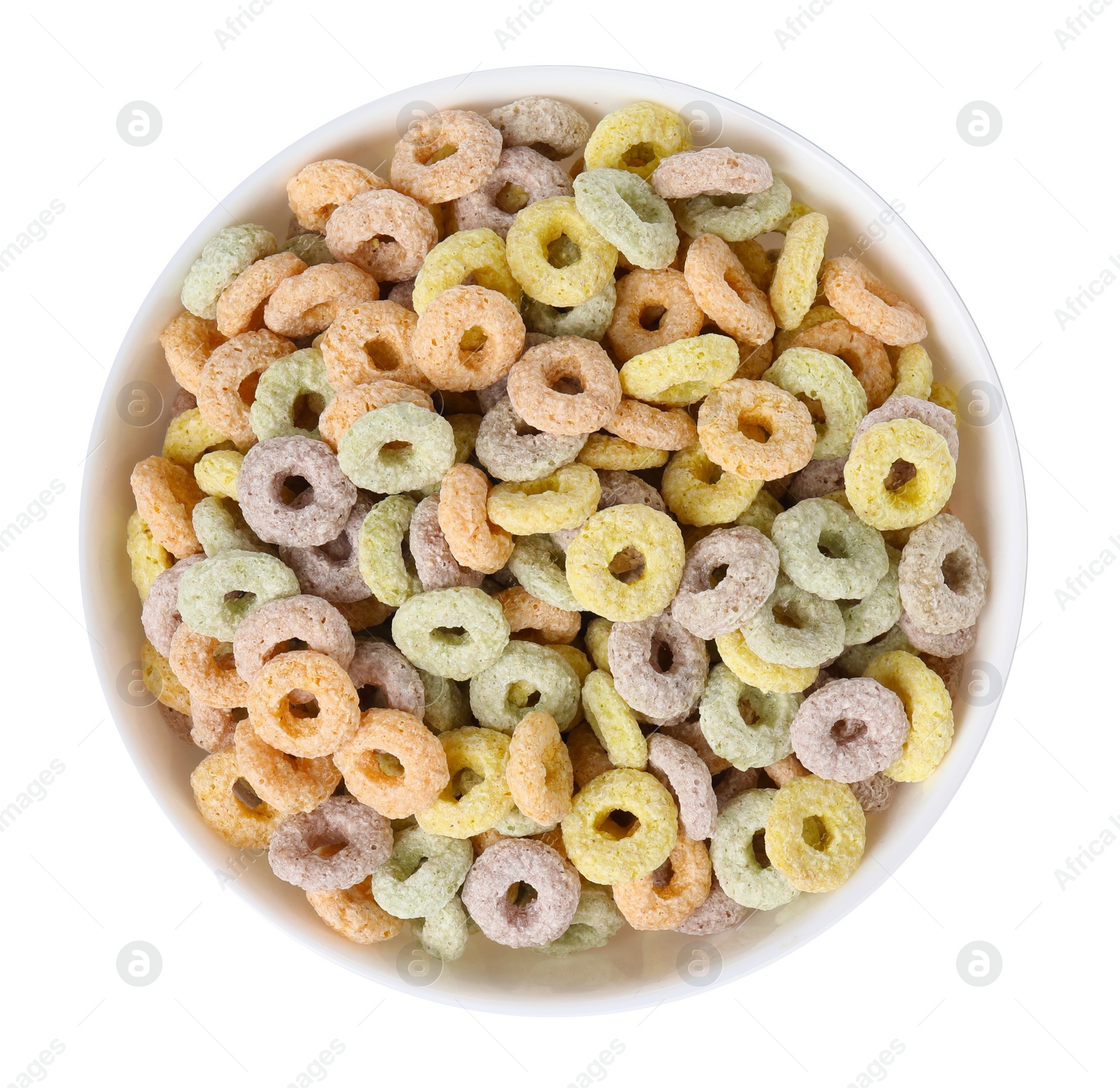 Photo of Tasty cereal rings in bowl isolated on white, top view