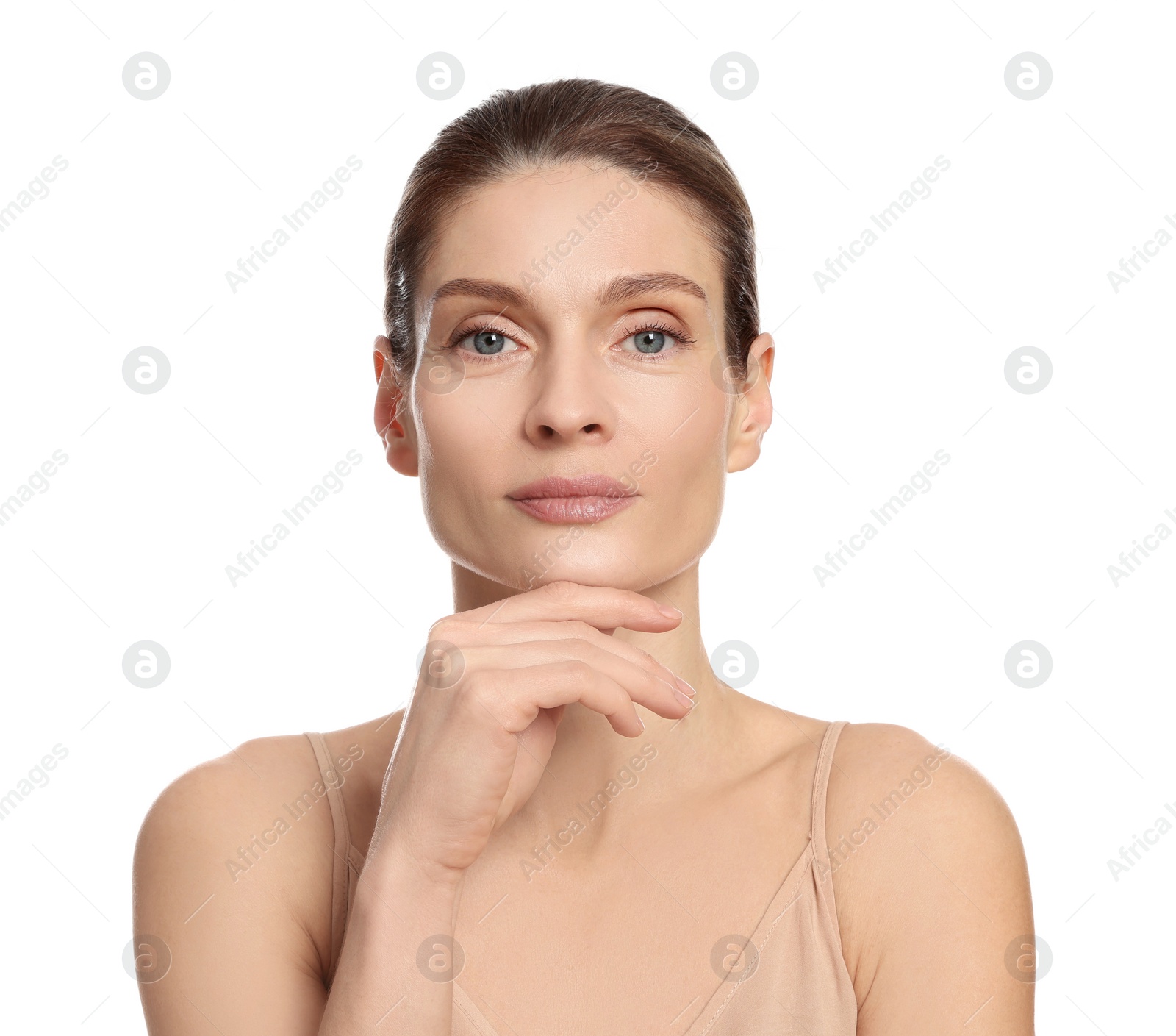 Photo of Woman massaging her face on white background