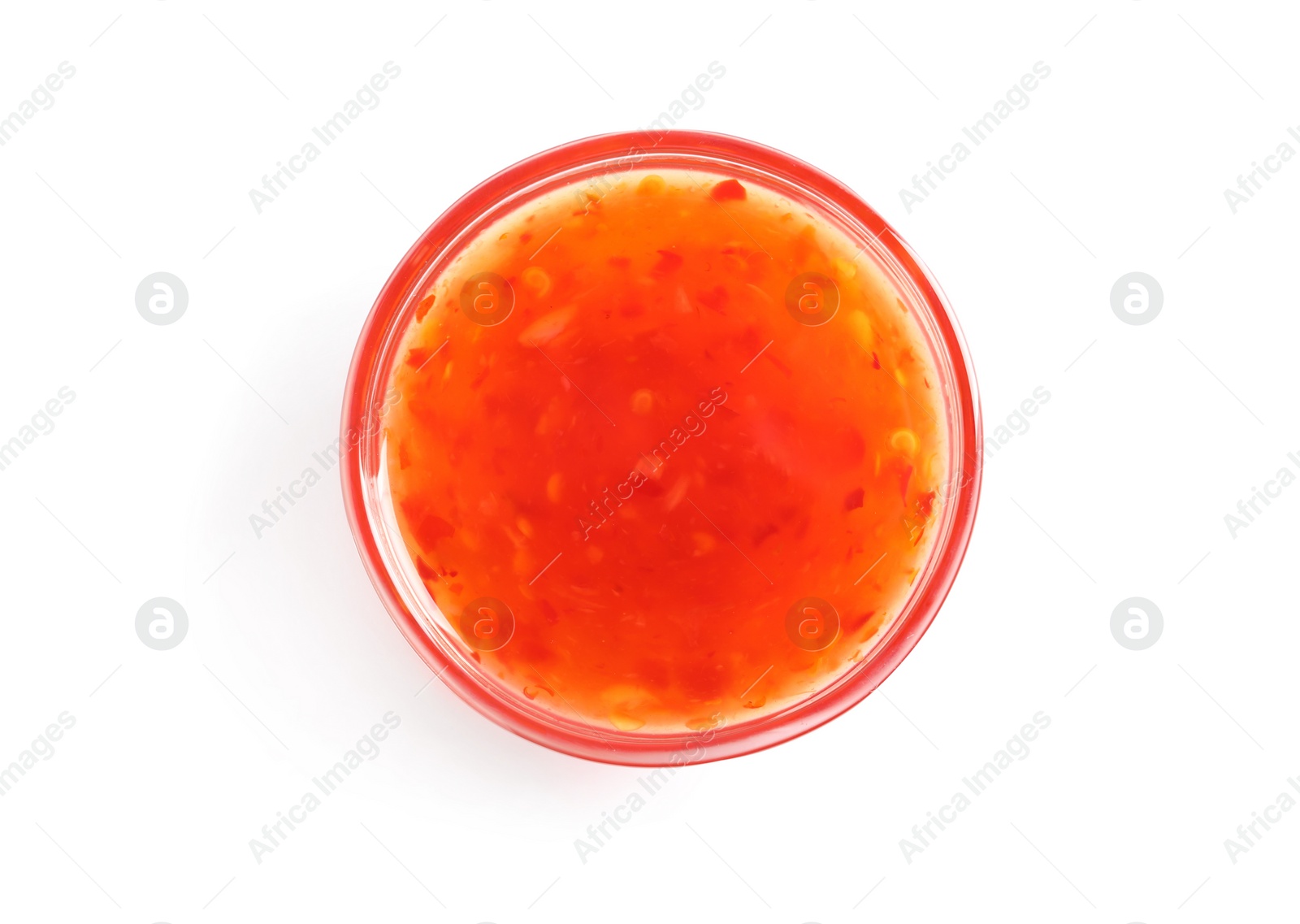 Photo of Delicious sweet chili sauce in bowl on white background, top view