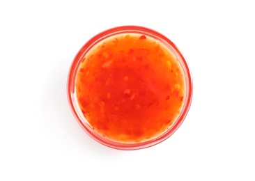Photo of Delicious sweet chili sauce in bowl on white background, top view