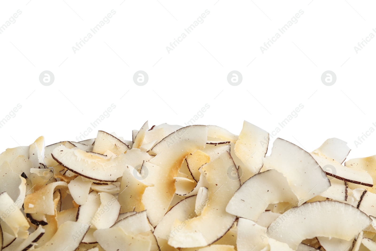 Photo of Pile of coconut chips isolated on white, top view