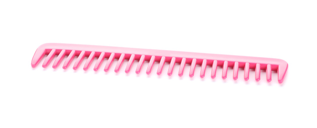 Photo of New pink hair comb isolated on white