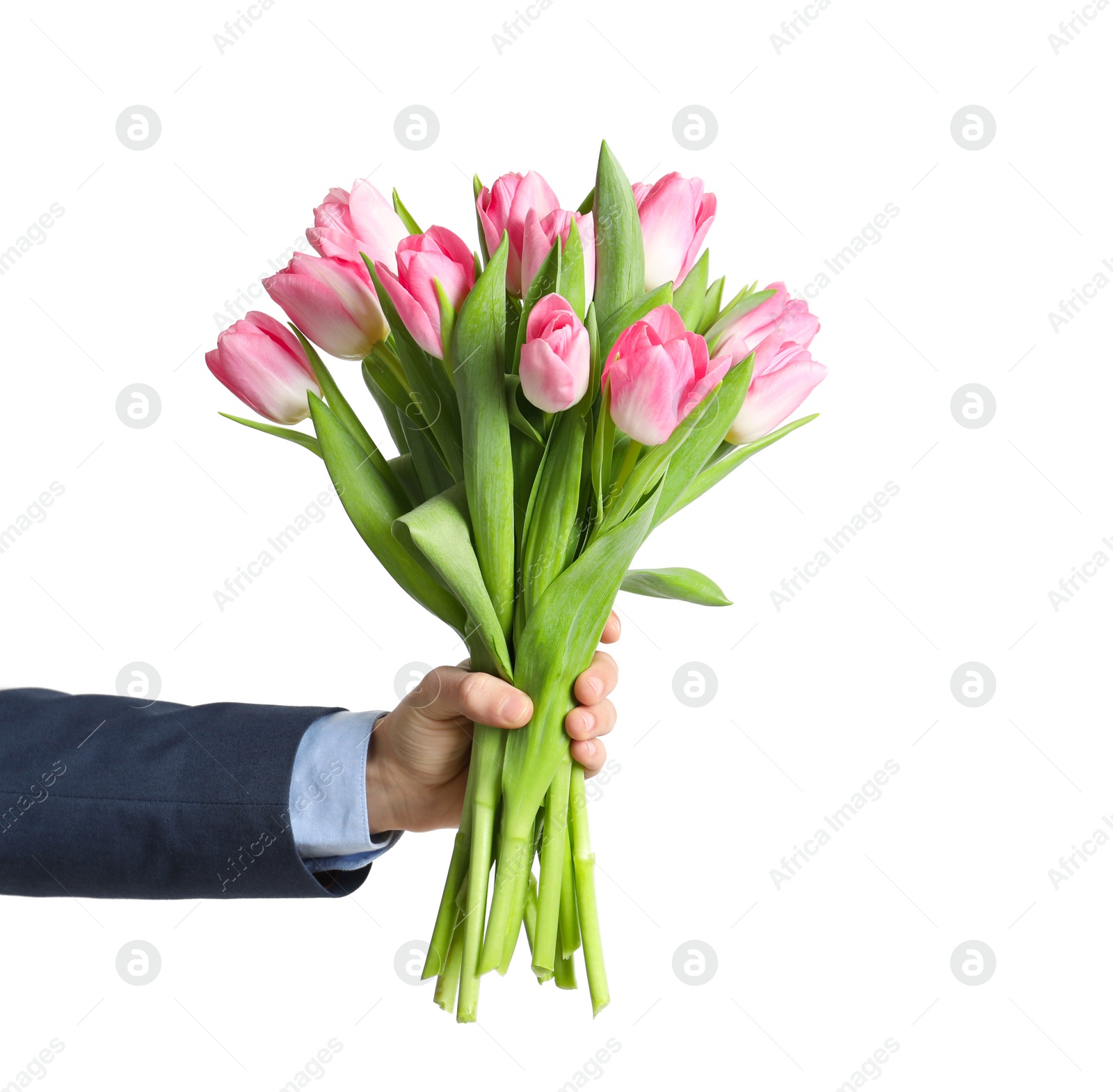 Photo of Man holding bouquet of beautiful spring tulips on light background, closeup. International Women's Day