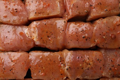 Photo of Cut raw marinated meat as background, top view