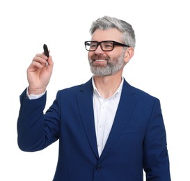 Mature businessman with marker on white background