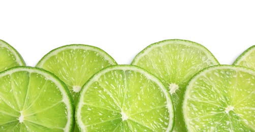 Fresh sliced ripe limes on white background, top view