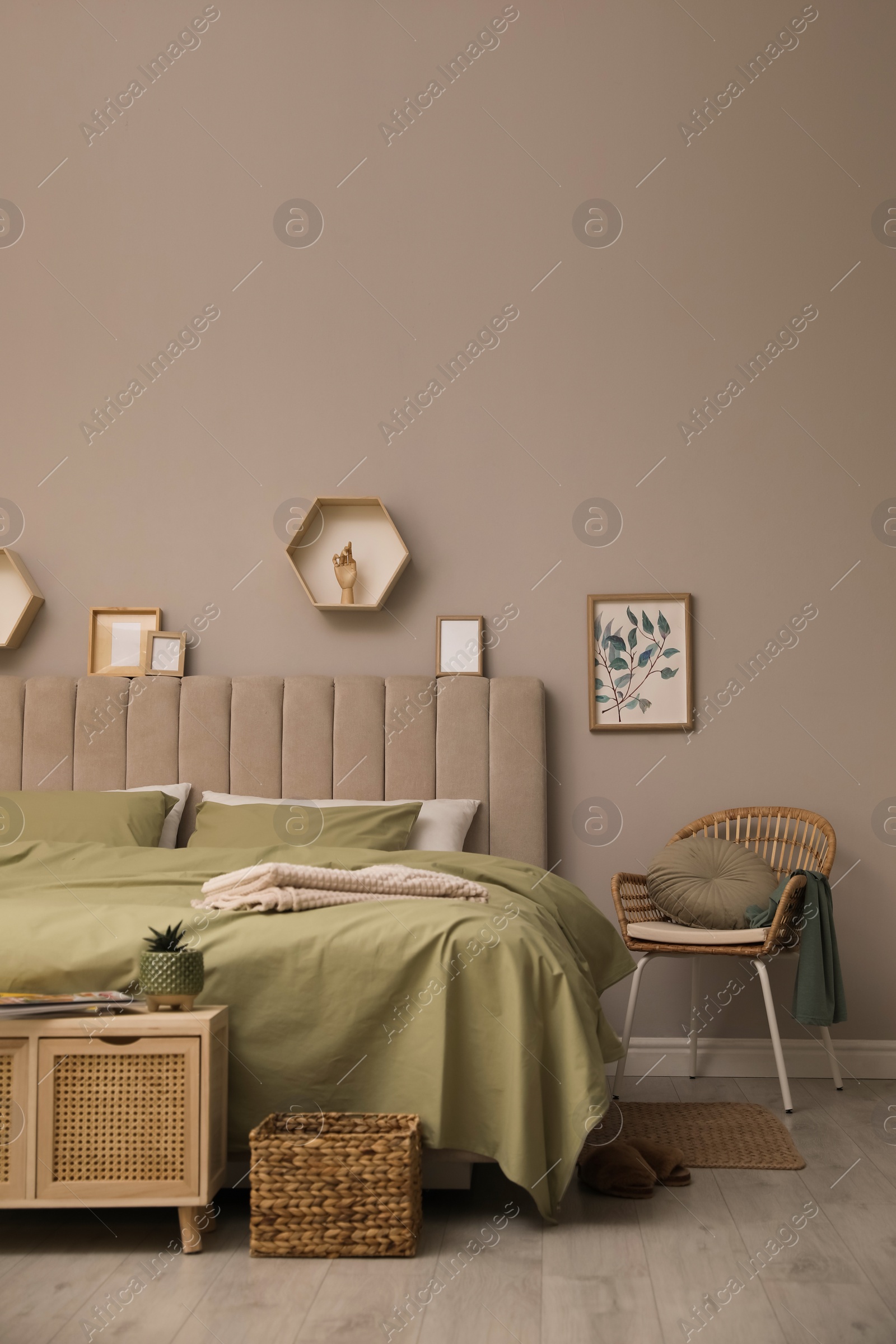 Photo of Large comfortable bed with beautiful linens in room