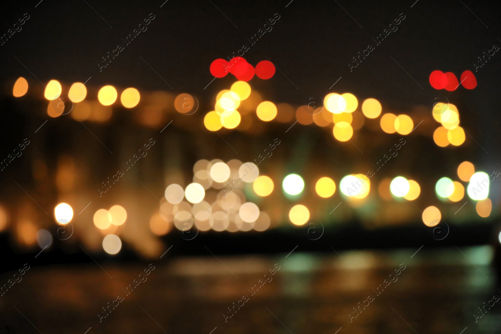 Photo of Blurred view of docks at night. Bokeh effect