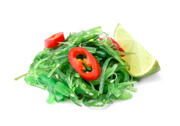 Photo of Pile of tasty seaweed salad isolated on white