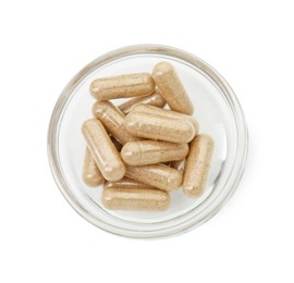 Photo of Vitamin capsules in bowl isolated on white, top view. Health supplement