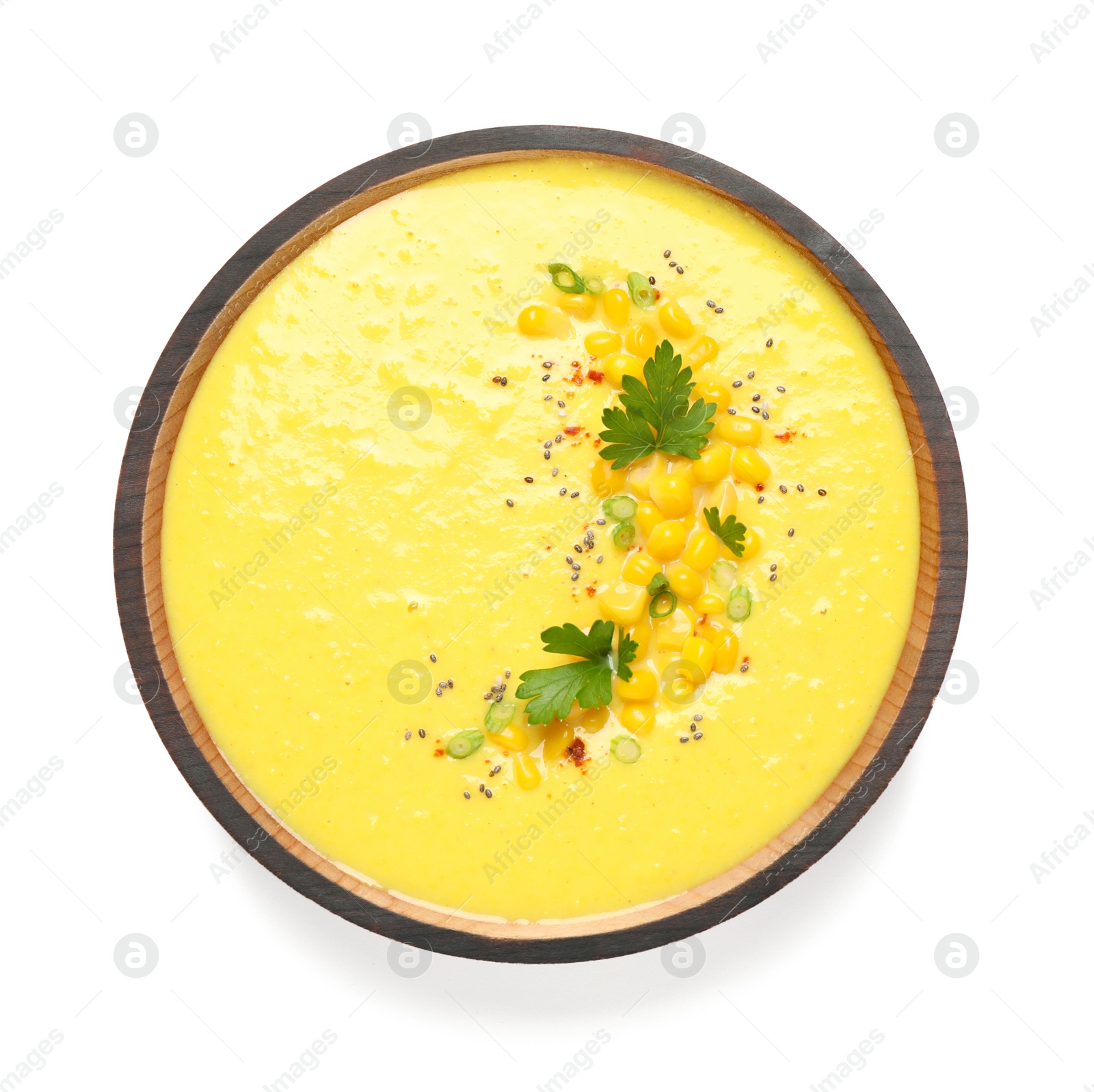 Photo of Delicious creamy corn soup isolated on white, top view