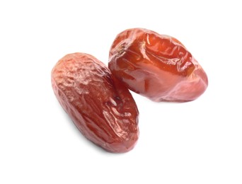 Photo of Tasty sweet dried dates on white background