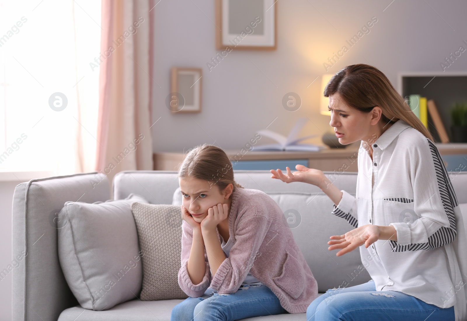Photo of Mother arguing with daughter at home