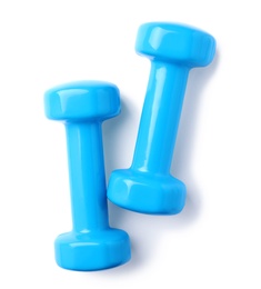 Photo of Color dumbbells on white background. Home fitness