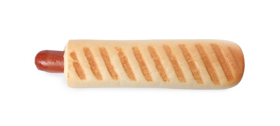 Photo of Tasty french hot dog with sauce isolated on white, top view