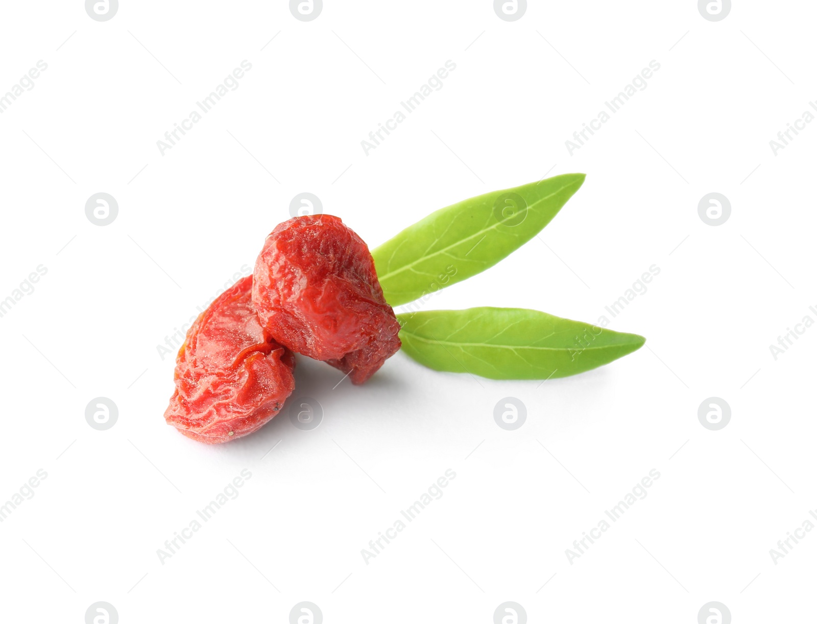 Photo of Tasty dried goji berries and leaves isolated on white