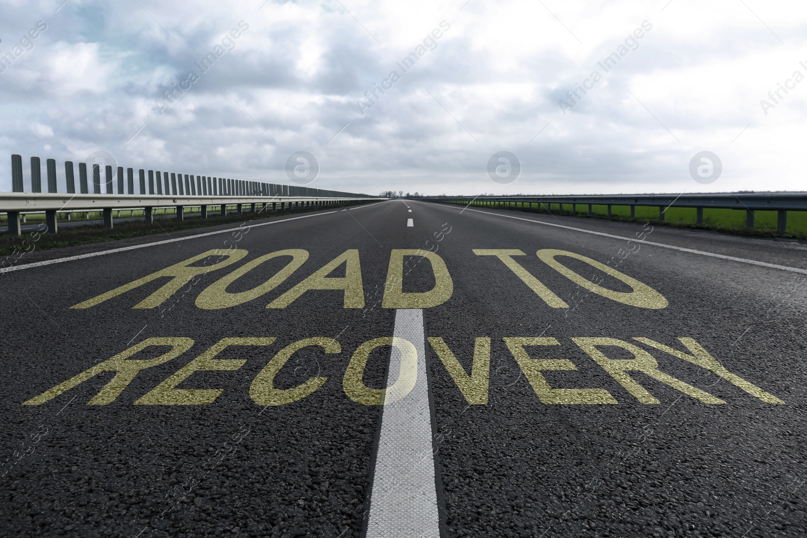 Image of Start to live without alcohol addiction. Phrase ROAD TO RECOVERY on asphalt highway
