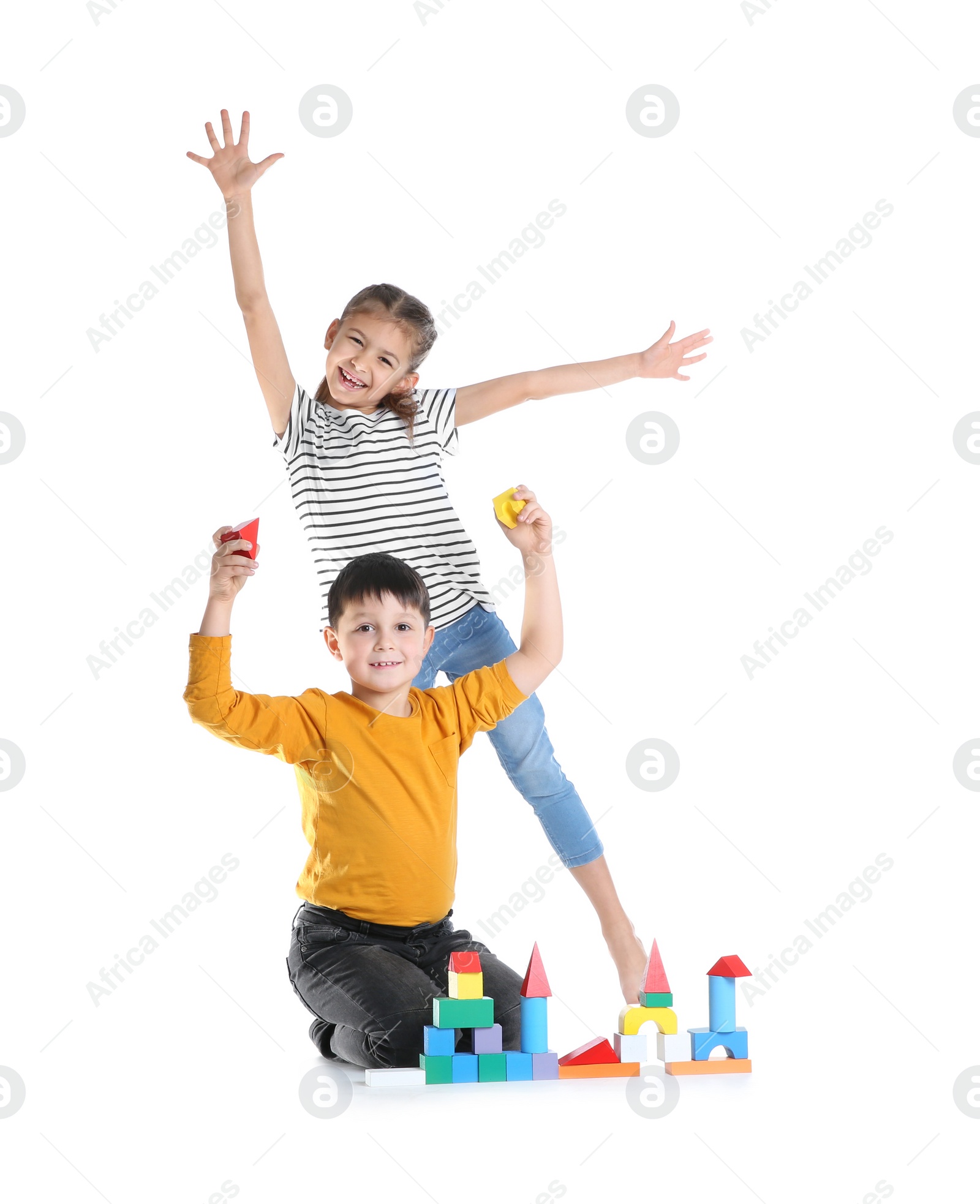 Photo of Cute children playing with colorful blocks on white background