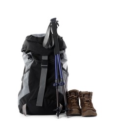 Photo of Pair of trekking poles and camping equipment for tourism on white background