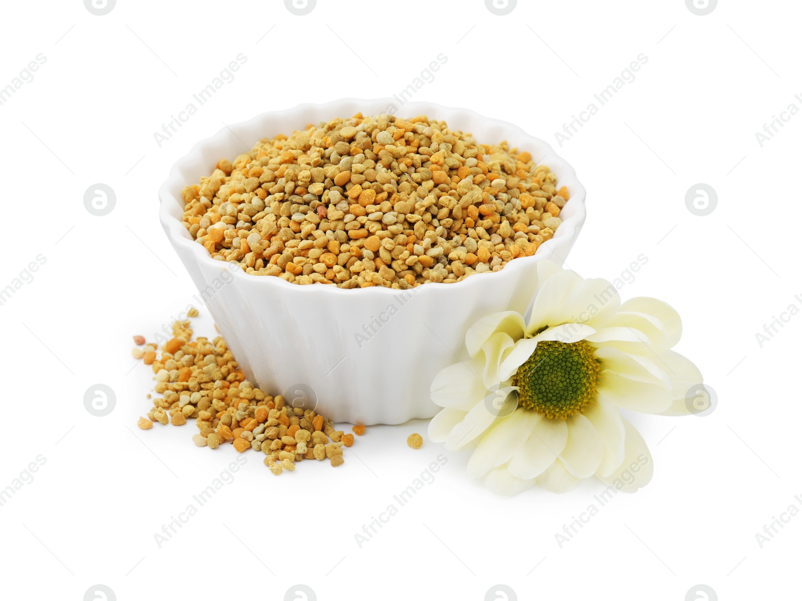 Photo of Fresh bee pollen granules in bowl and flower isolated on white