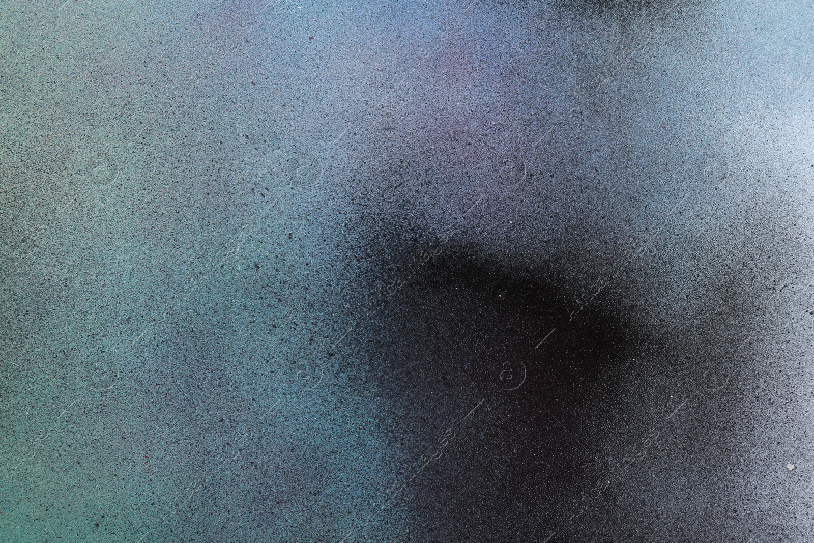 Photo of Texture of abstract spray paint as background, top view