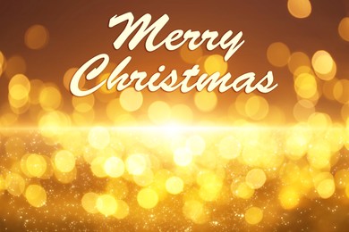 Image of Text Merry Christmas on blurred background with golden lights. Bokeh effect