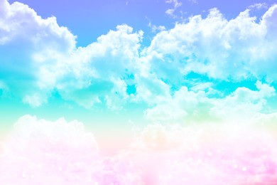 Image of Magic sky with fluffy clouds toned in rainbow colors
