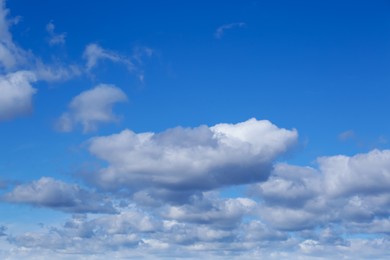 Picturesque blue sky with white clouds on sunny day