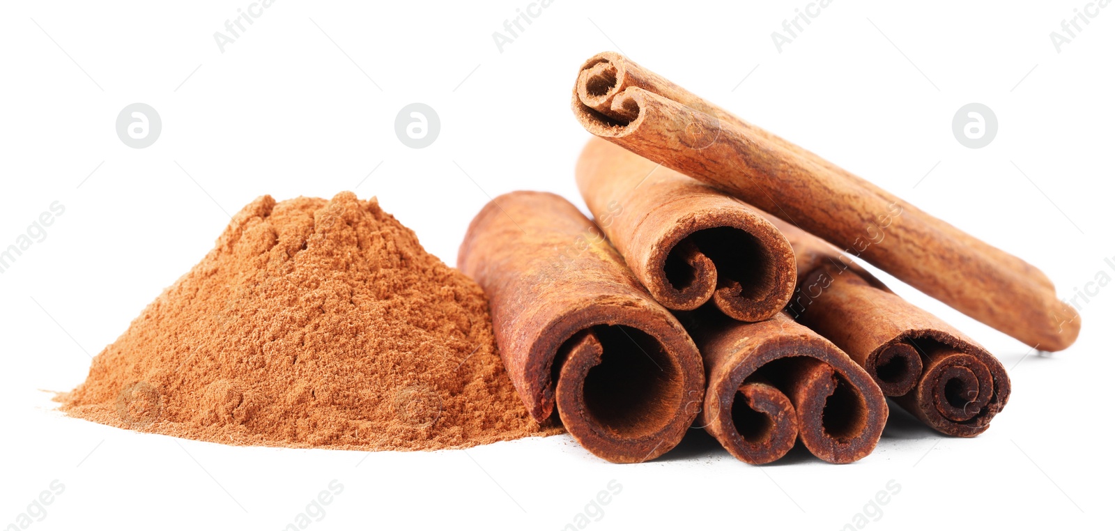 Photo of Dry aromatic cinnamon sticks and powder isolated on white