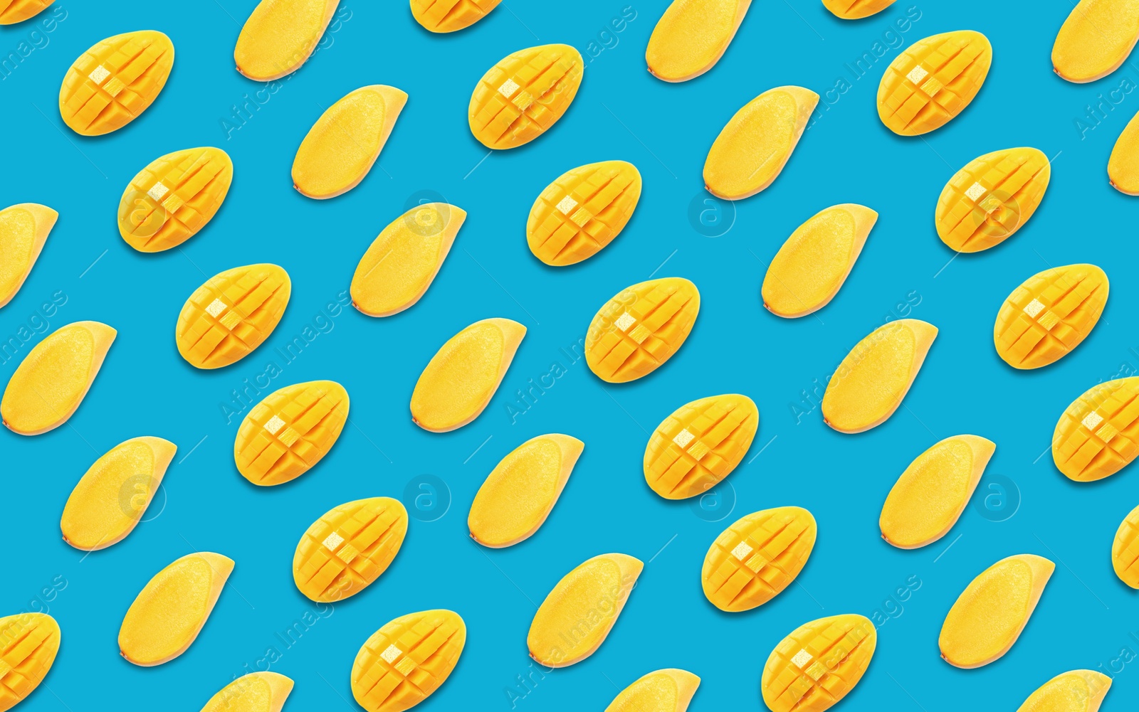 Image of Pattern of cut mango fruits on blue background