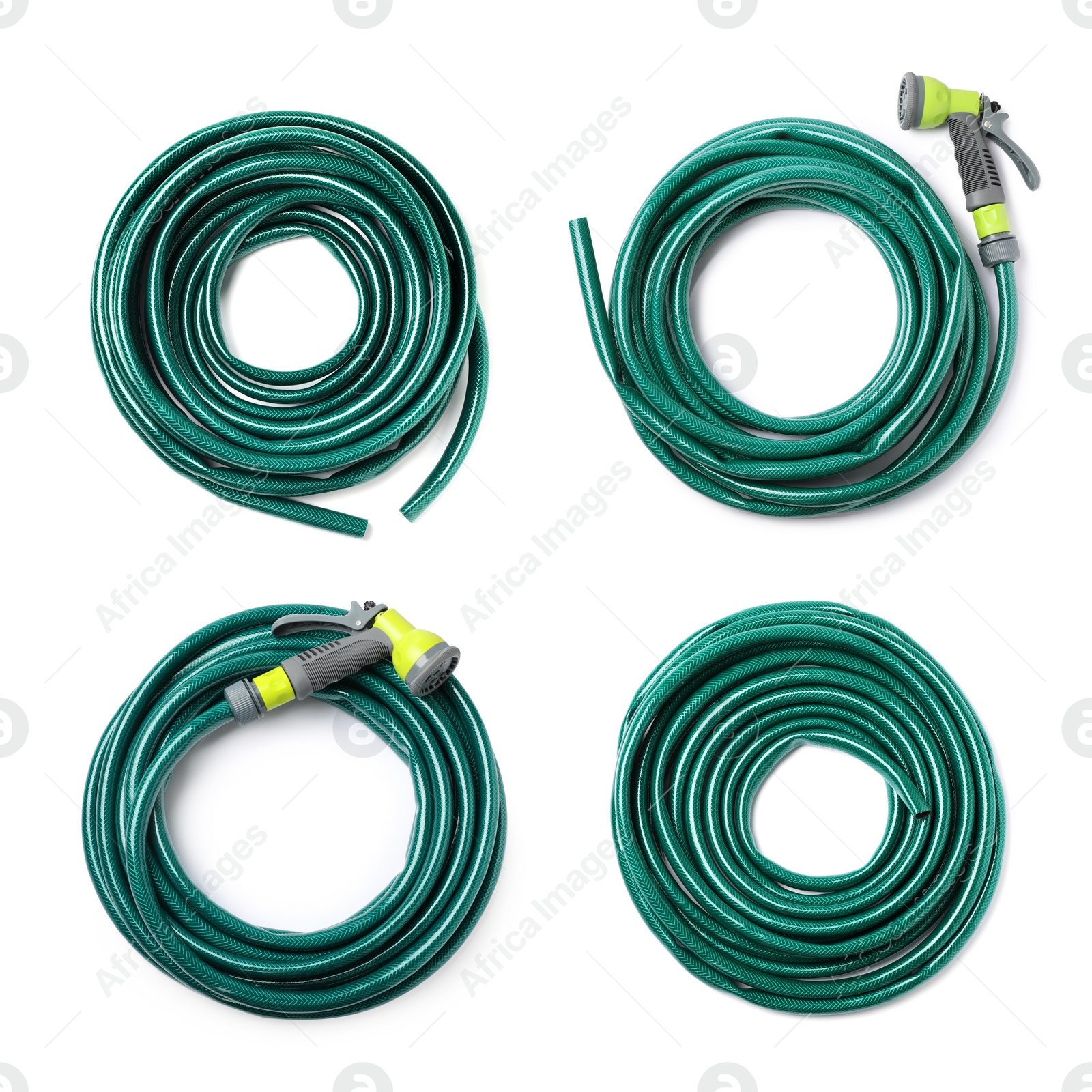 Image of Set with green rubber watering hoses on white background, top view
