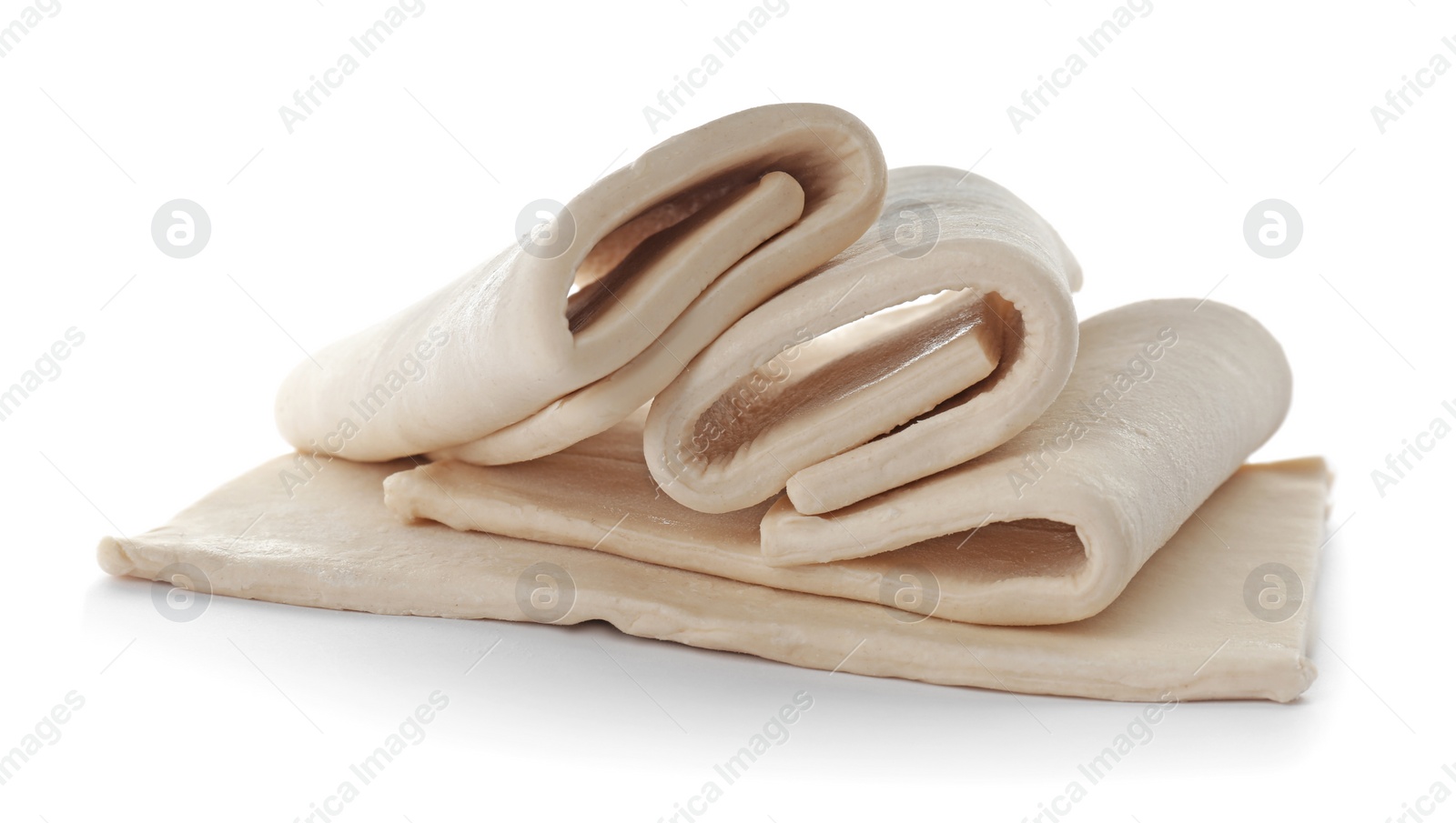 Photo of Fresh raw dough on white background