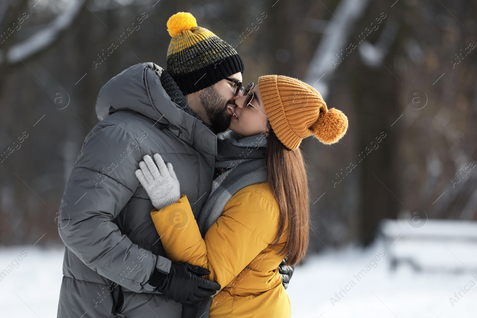 Photo of Beautiful happy couple outdoors on winter day