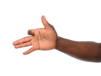 Photo of African-American man gesturing dog head on white background, closeup