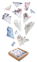 Image of Many different handkerchiefs falling into box on white background 