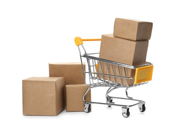 Photo of Shopping cart and boxes isolated on white. Logistics and wholesale concept