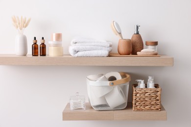 Different bath accessories and personal care products indoors