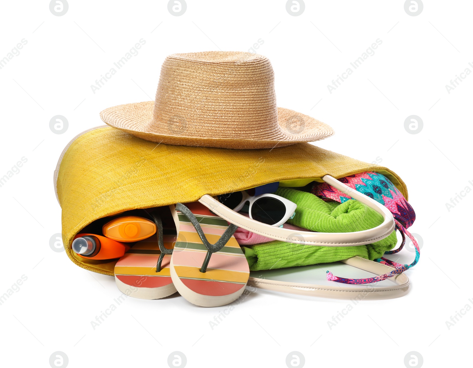 Photo of Different stylish beach accessories on white background