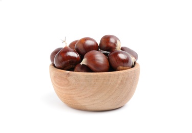 Photo of Fresh sweet edible chestnuts in wooden bowl on white background