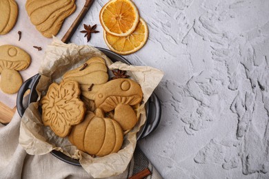 Photo of Flat lay composition with tasty cookies and spices on white textured table. Space for text