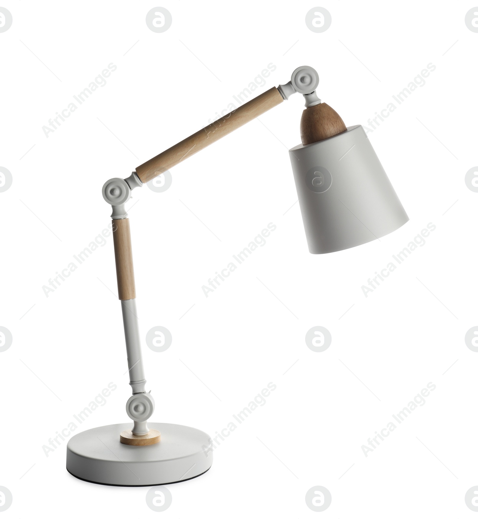 Photo of Stylish modern desk lamp isolated on white