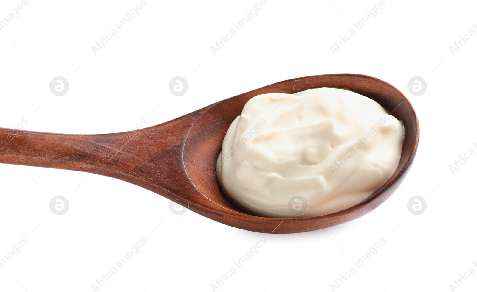 Photo of Wooden spoon with tasty mayonnaise isolated on white