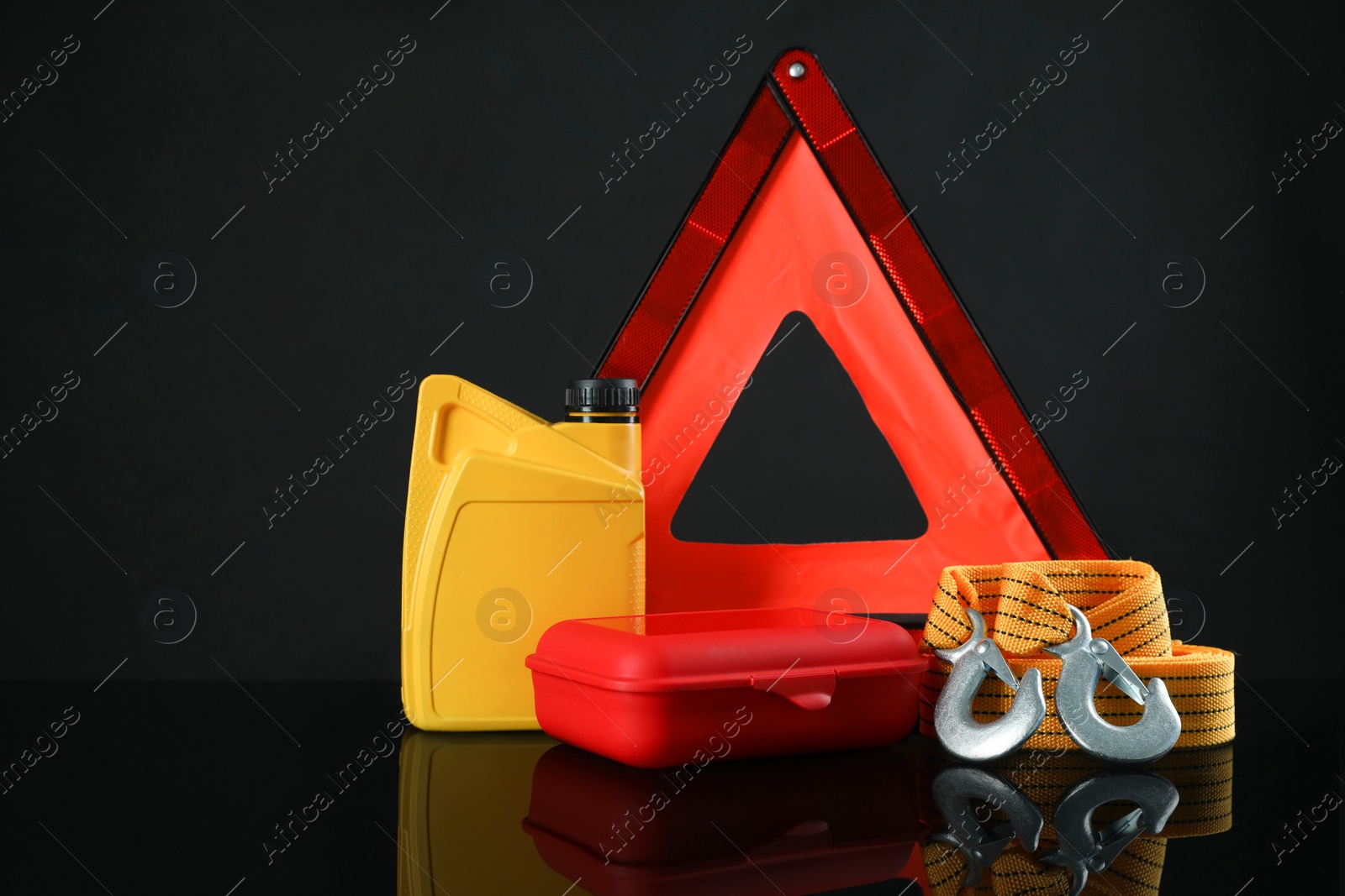 Photo of Set of car safety equipment on black background