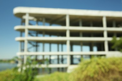 Blurred view of unfinished building against blue sky